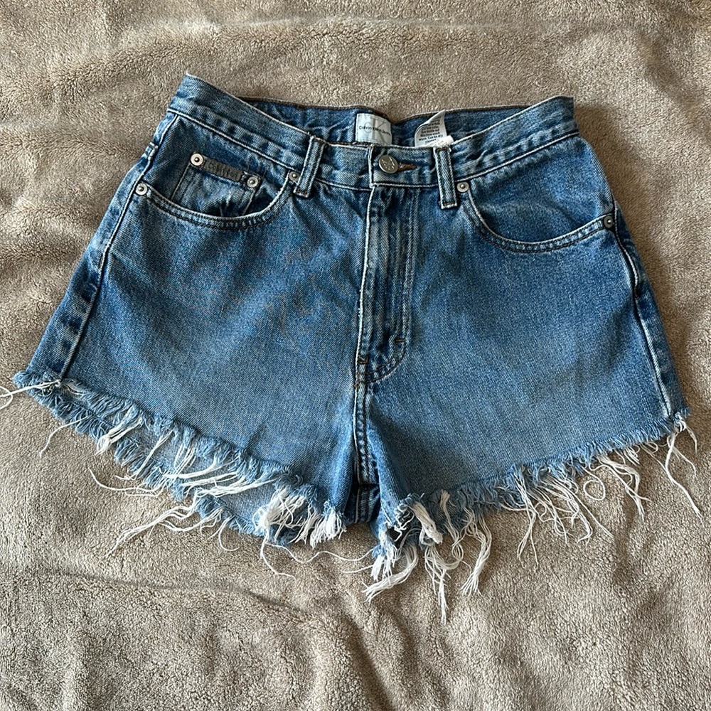Calvin Klein women’s cut off denim shorts - size 6